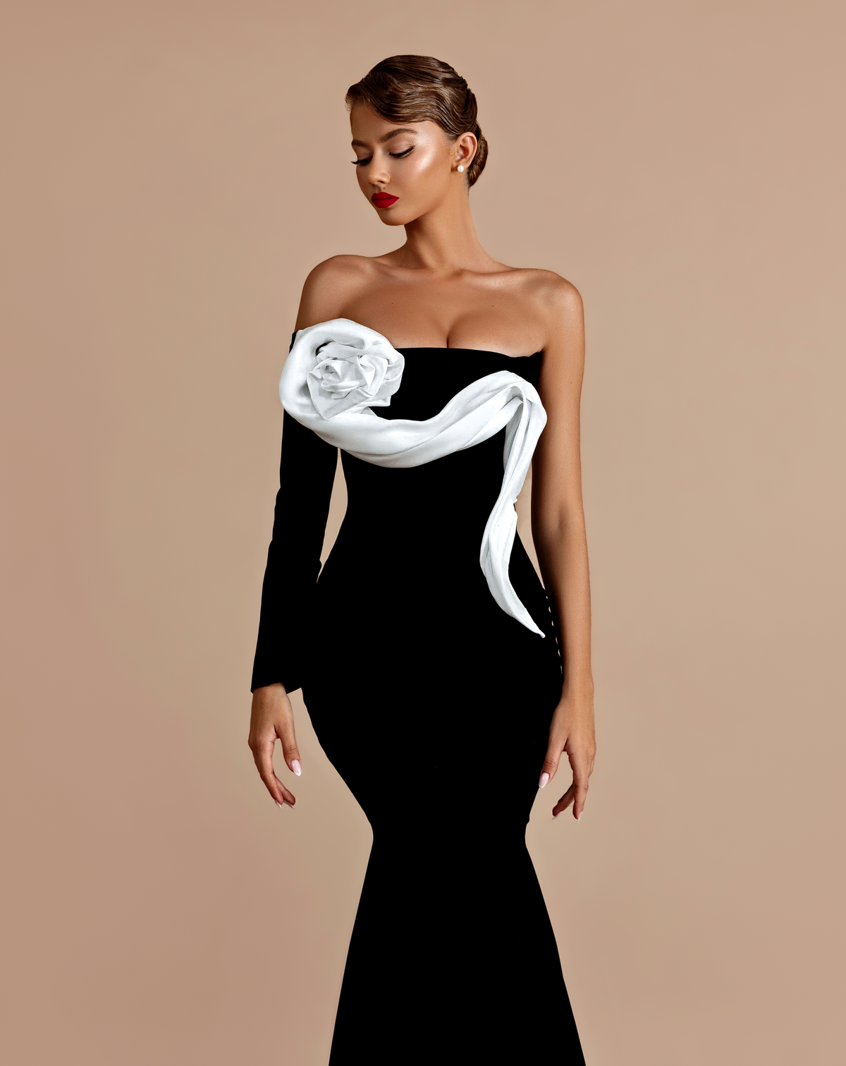 One sleeve black gown with white floral detail