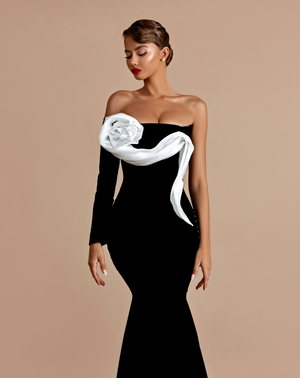 One sleeve black gown with white floral detail