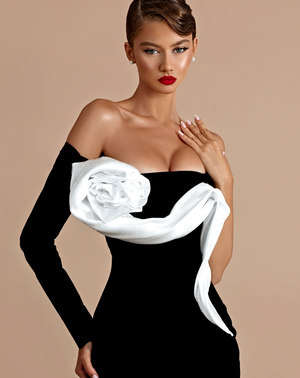 One sleeve black gown with white floral detail