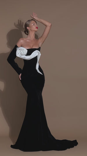 One sleeve black gown with white floral detail